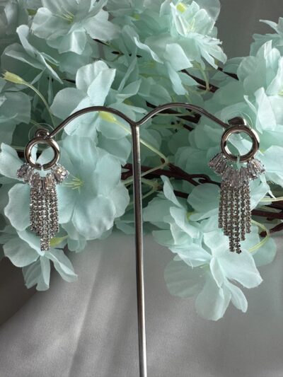 Dazzling cascading crystal studded silver toned earrings