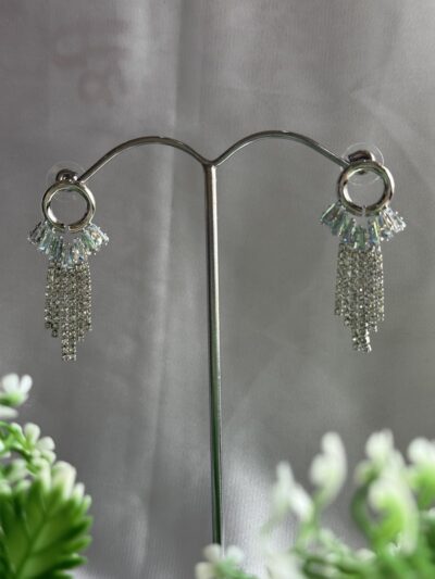 Dazzling cascading crystal studded silver toned earrings