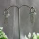 Dazzling cascading crystal studded silver toned earrings