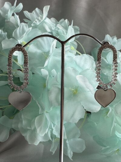 Silver toned heart dangle crystals studded earrings