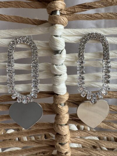 Silver toned heart dangle crystals studded earrings