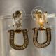 Gold toned crystal studded drop earrings