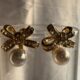Exquisite golden bow shaped earrings