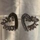 Silver toned stone studded heart shape earrings