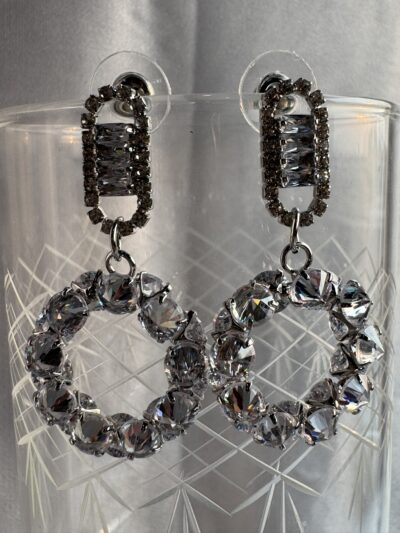Sparkling circle silver toned stone studded drop earrings