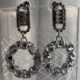 Sparkling circle silver toned stone studded drop earrings
