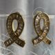 Golden ribbon shaped earrings