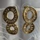 Gold toned beautiful stone studded rich baguette cut earrings