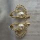 Silver toned crystals and pearl studded heart shape earrings