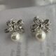 Silver toned bow shape earrings