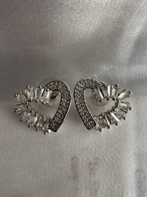 Silver toned stone studded heart shape earrings