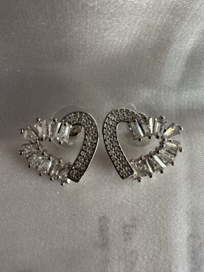 Silver toned stone studded heart shape earrings