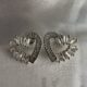 Silver toned stone studded heart shape earrings