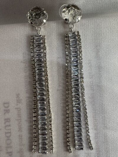 Stone studded glamorous long drop dazzling silver toned earrings