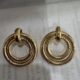 Gold toned double loop earrings