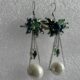 Beautiful pearl drop with blue-green beaded cluster settings at top in silver-tone chain earrings