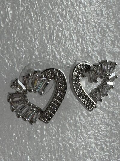 Silver toned stone studded heart shape earrings