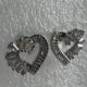 Silver toned stone studded heart shape earrings
