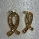 Golden ribbon shaped earrings