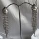 Breathtakingly radiant chandelier silver toned earrings