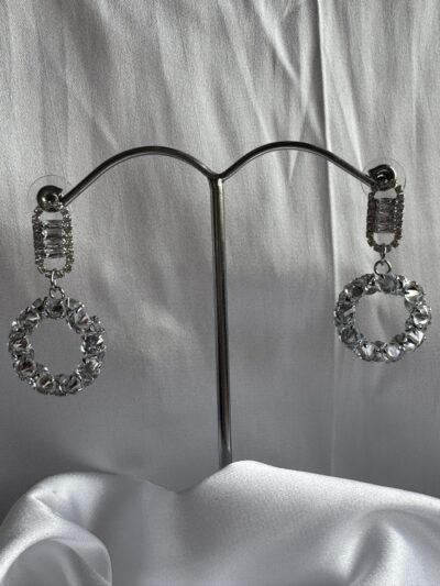 Sparkling circle silver toned stone studded drop earrings