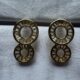 Gold toned beautiful stone studded rich baguette cut earrings