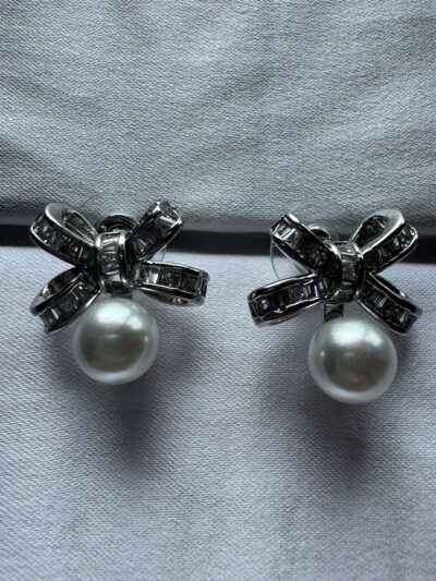 Silver toned bow shape earrings