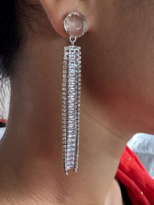Stone studded glamorous long drop dazzling silver toned earrings