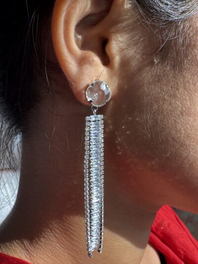 Stone studded glamorous long drop dazzling silver toned earrings