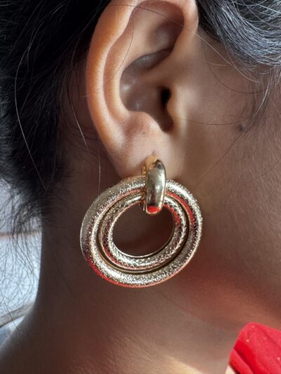 Gold toned double loop earrings