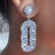 Dangling geometric crystal studded silver toned earrings