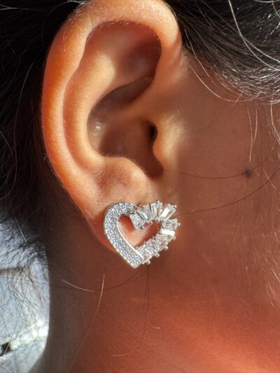 Silver toned stone studded heart shape earrings