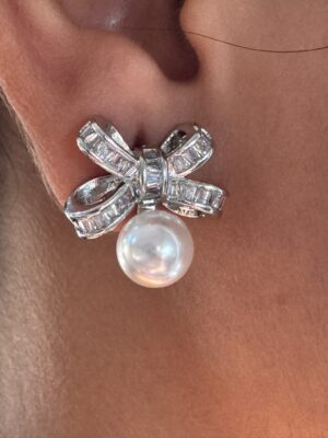 Silver toned bow shape earrings