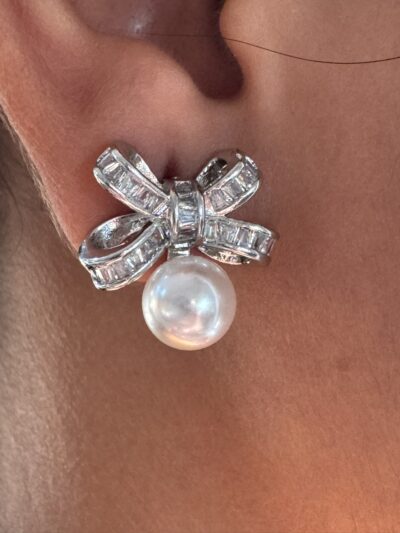 Silver toned bow shape earrings