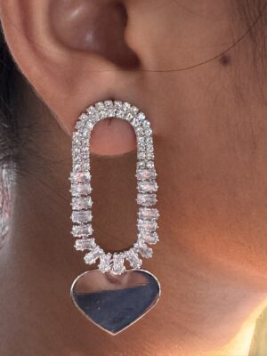 Silver toned heart dangle crystals studded earrings