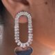 Silver toned heart dangle crystals studded earrings