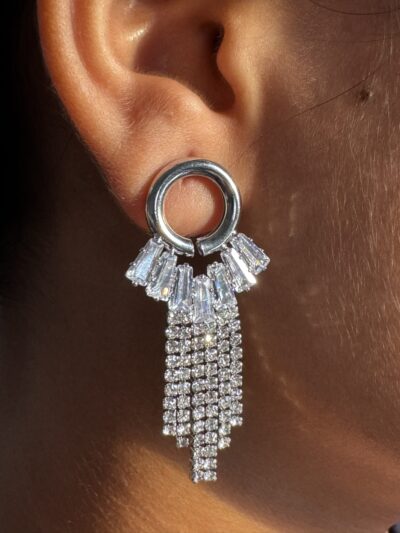 Dazzling cascading crystal studded silver toned earrings
