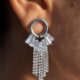 Dazzling cascading crystal studded silver toned earrings