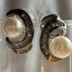 Silver-tone shimmering crystal studded curve with pearl beauty