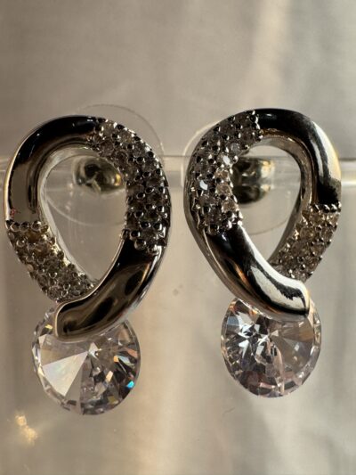 IMG_2555 Elegant crystal drop silver tone oval design with studded crystals earrings