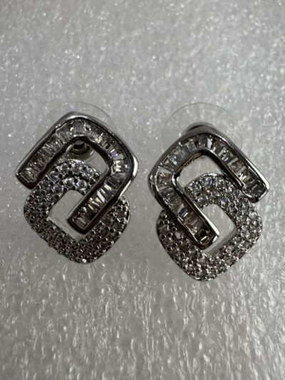 Crystal embellished geometric modern design silver tone stud earrings