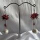 Pearl chain drop with red flower long beads cluster at top in silver tone chain earrings