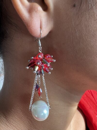 Pearl chain drop with red flower long beads cluster at top in silver tone chain earrings