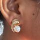 Gold-tone shimmering crystal studded curve with pearl beauty