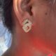 Crystal-encrusted geometric statement earrings, gold-plated, modern design