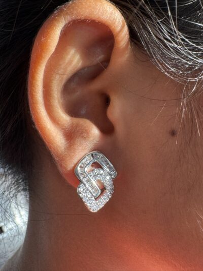 Crystal embellished geometric modern design silver tone stud earrings