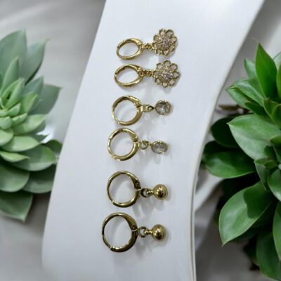 Image 1 (5) Crystal Studded Gold Plated Flower Hoop Earrings Set, 3 Pairs, Dangle Drop Design with Ball and Oval Charms