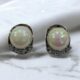 Vintage style pearl with crystal accents silver toned earrings