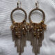 Handcrafted golden biege dangler hoop earrings